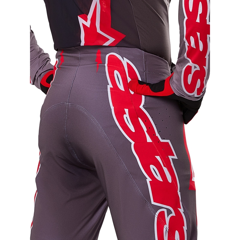 Spodnie motocrossowe Alpinestars Supertech Lipan w kolorze dymno-czerwonym
