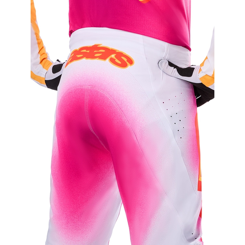 Spodnie motocrossowe Alpinestars Supertech Limited Edition MIG Fluo w kolorze różowo-biało-pomarańczowym
