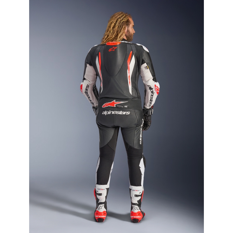 Jednoczęściowy skórzany kombinezon motocyklowy Alpinestars GP TECH V5 w kolorze czarno-biało-fluo-czerwonym