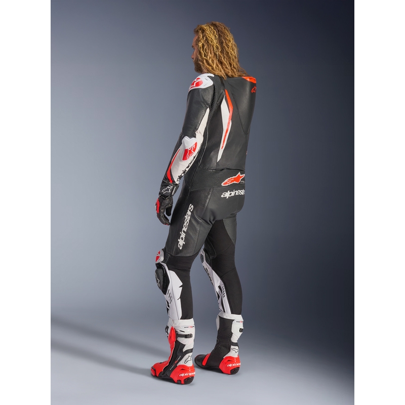 Jednoczęściowy skórzany kombinezon motocyklowy Alpinestars GP TECH V5 w kolorze czarno-biało-fluo-czerwonym