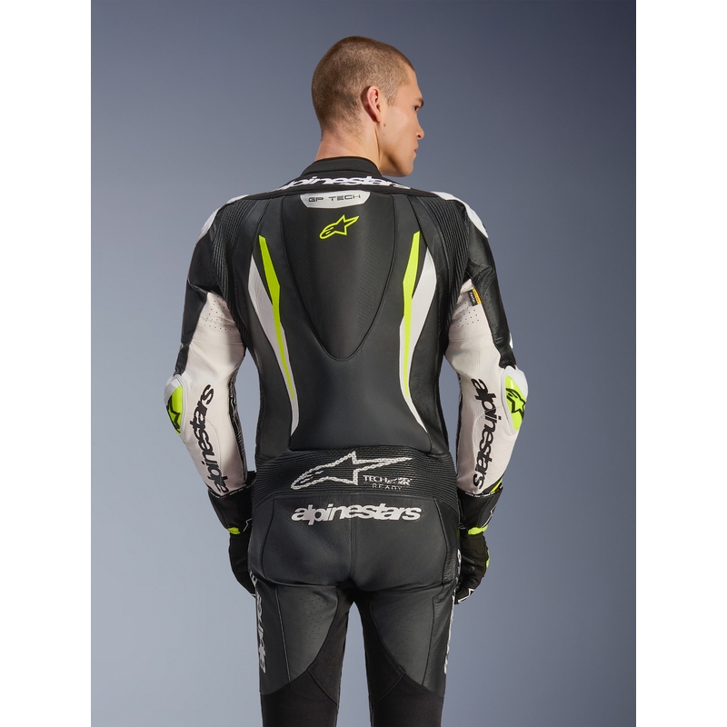 Jednoczęściowy skórzany kombinezon motocyklowy Alpinestars GP TECH V5 w kolorze czarno-biało-fluo-żółtym