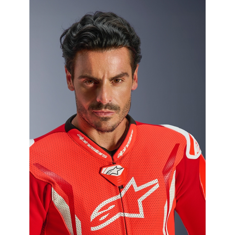 Jednoczęściowy skórzany kombinezon motocyklowy Alpinestars GP TECH V5 w kolorze czerwono-czerwono-białym fluo